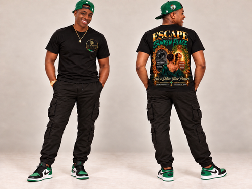 A model wearing a black LBH t-shirt and black cargo pants from both the front and back views, wearing a green cap and green and black sneakers, against a neutral studio background.